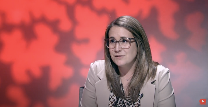 screenshot of woman during interview