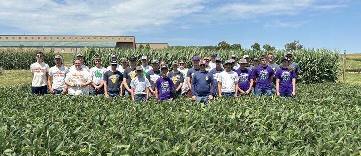 Group photo of youth in field