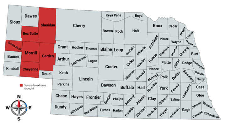 Map of Nebraska highlighting western counties in red showing areas at risk of severe to extreme drought in 2026 growing season.