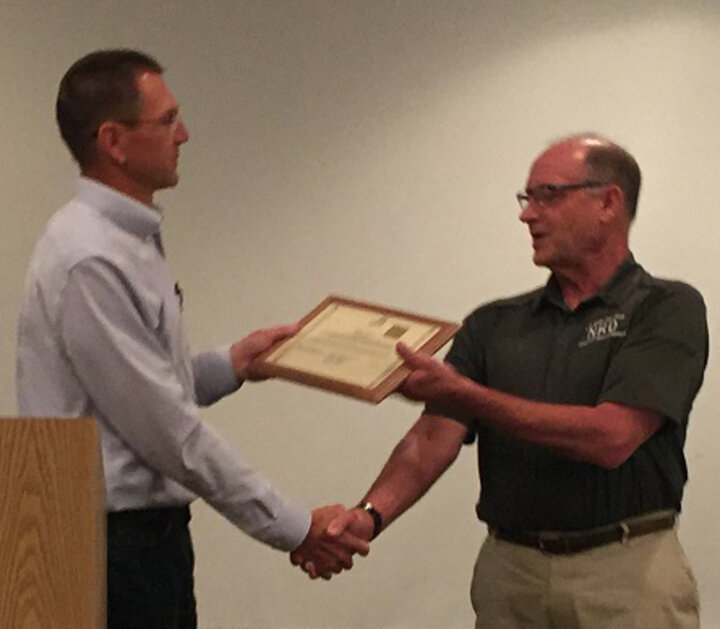 Dave Clabaugh receiving LBB NRD award from Doug Garrison