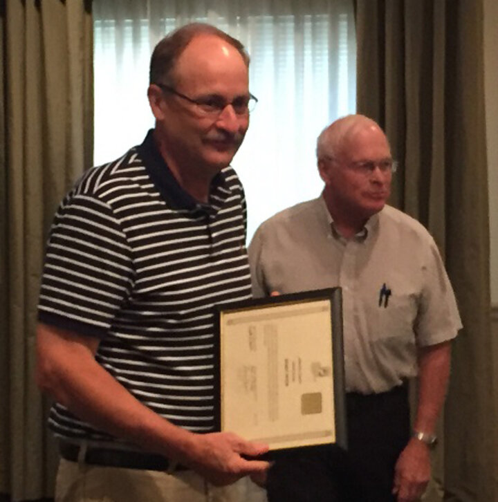 Randy Pryor receiving resource conservation award