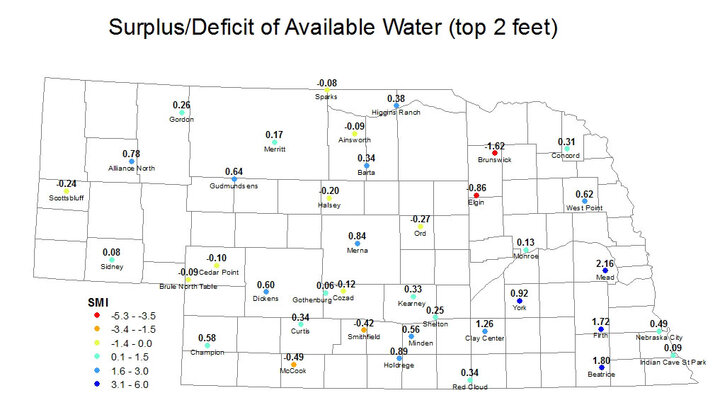 Nebraska map showing surplus or deficit soil moisture at specific sites.