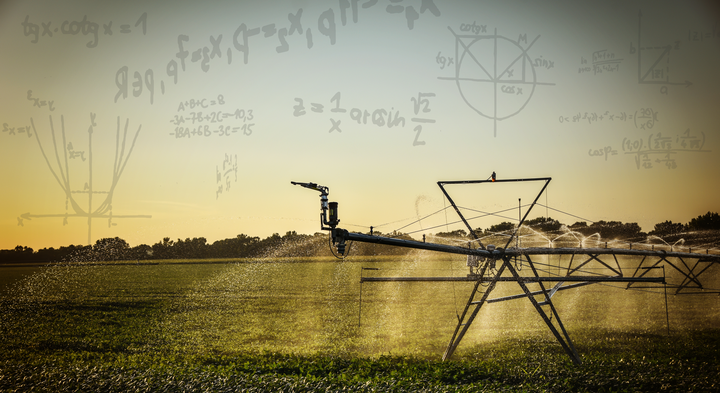 center pivot in field below hovering calculations