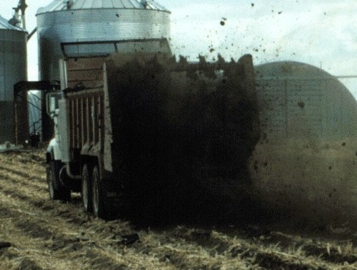 Spreading manure on land