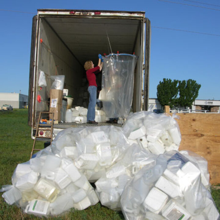 UNL staff recycling pesticide containers