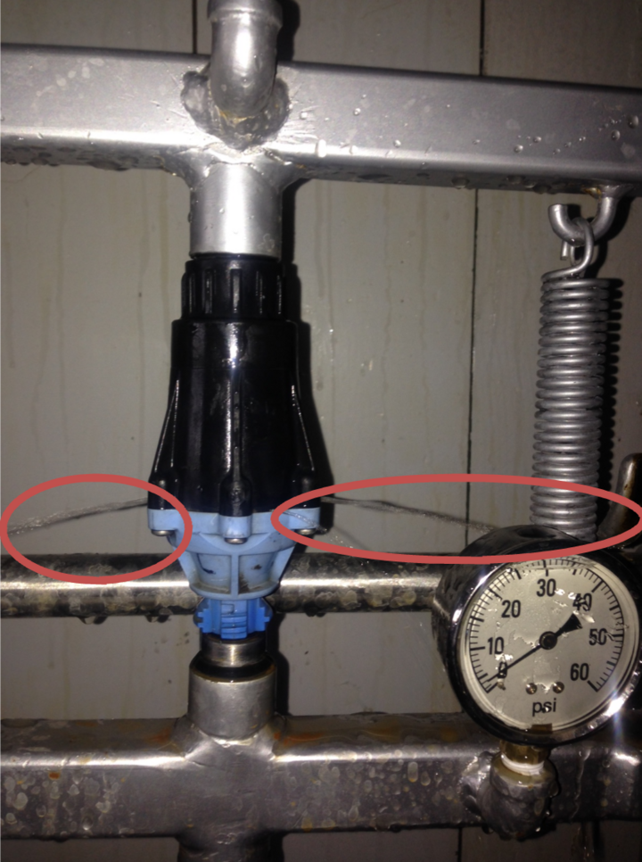 Water leaking from center pivot pressure regulator