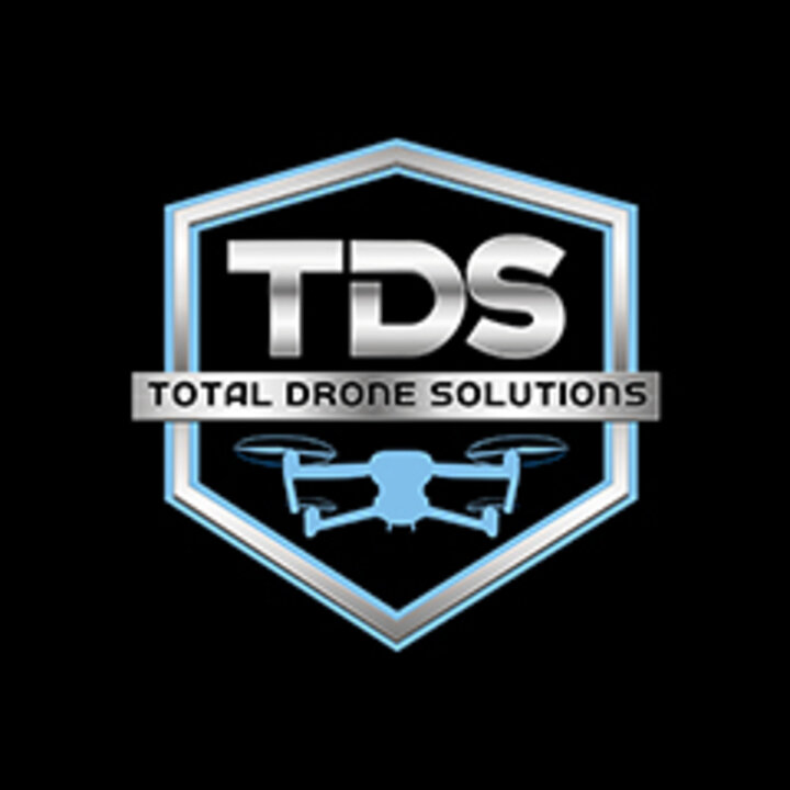 Total Drone Solutions logo featuring a silver drone icon and metallic shield with the acronym "TDS" above the words "Total Drone Solutions"