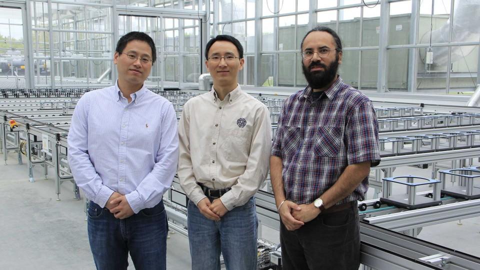 Hongfeng Yu (from left), Yufeng Ge and Harkamal Walia have received a National Science Foundation grant to develop a multi-wavelength laser ranging and imaging instrument for phenotyping plant shoots at the whole-plant level. (Hailey Steinkuhler/IANR Media)