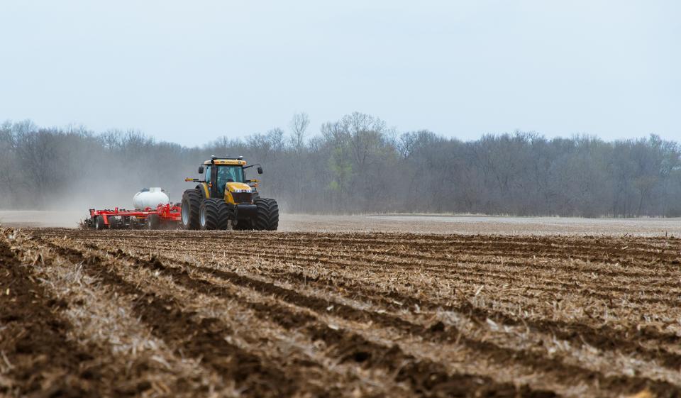 Anhydrous ammonia being applied in a field