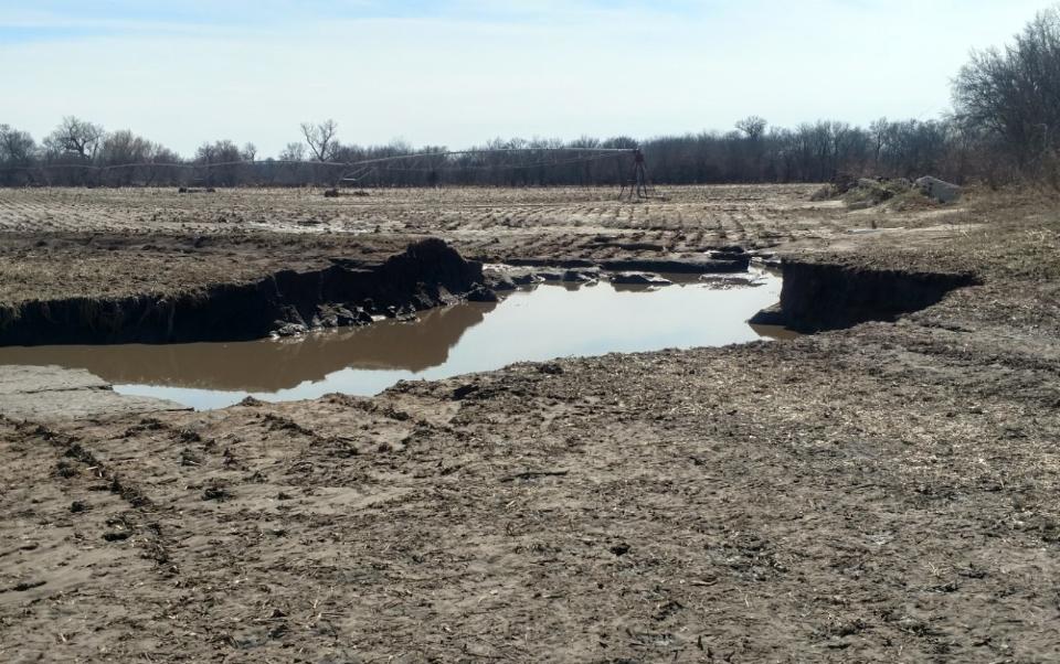 Significant soil erosion in a flooded field