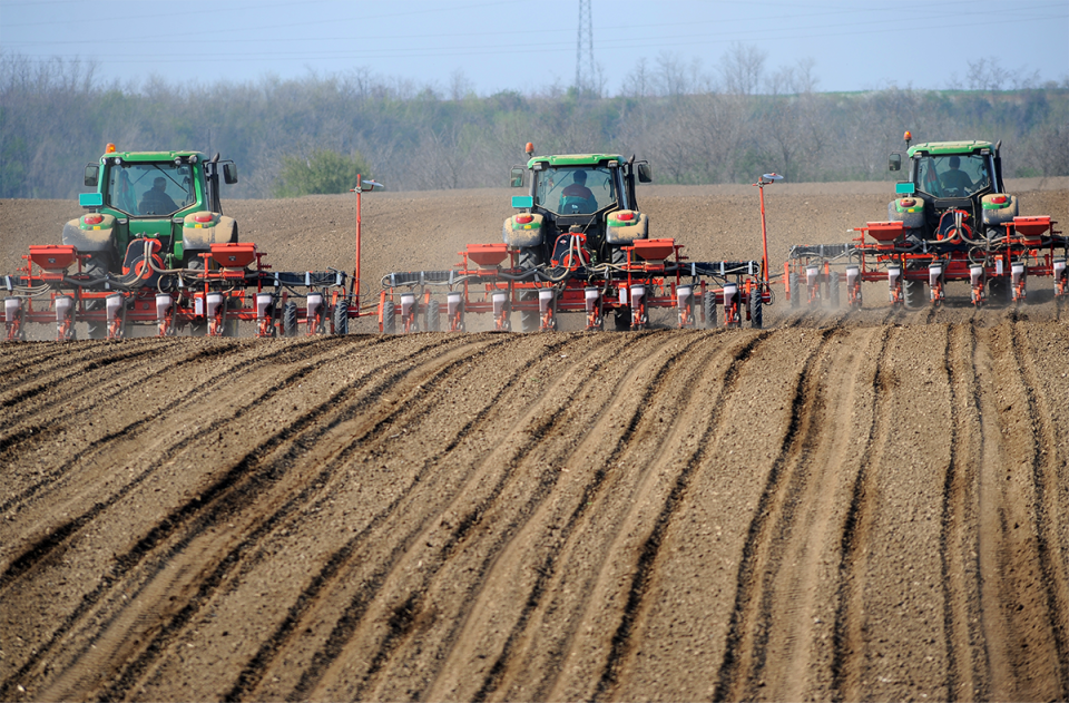 Tractors prepping field