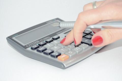 hand using a calculator