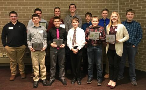 Figure 1. Youth attending the Innovative Youth Corn Challenge banquet were recognized for their efforts throughout the 2017 crop season to test corn production practices in science-based field trials. (Back Row L-R: Isaac Stromberg, Kade Stromberg, Juliana Loudon, Korbin Kudera, Hayden Beccard, Levi Schiller, James Rolf. Front Row L-R: Gavin Nelson, Rylan Nelson, Nolan Beccard, Landon Hasenkamp and Payton Schiller.) (Photos by Brandy VanDeWalle)
