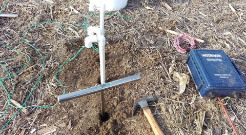 Soil moisture sensor only partially installed due to dry ground